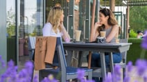 Guests enjoying hot drinks on the Arden Terrace at Studley Castle Hotel