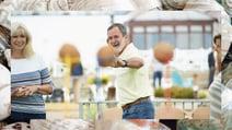 A gentleman preparing to throw a ball at the coconut shy, one of the many games found on the grounds at Corton, a Warner Village. The border depicts sea shells that can be found on the nearby beach.