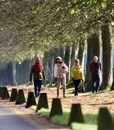 Guests walking through the grounds of Littlecote House Hotel