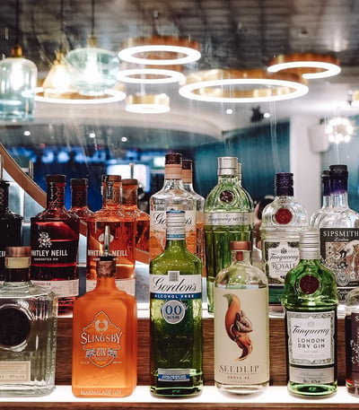 A close up of bottles of spirits on the bar at Sinah Warren