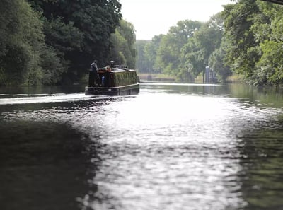 A boat sailing along The River Thames