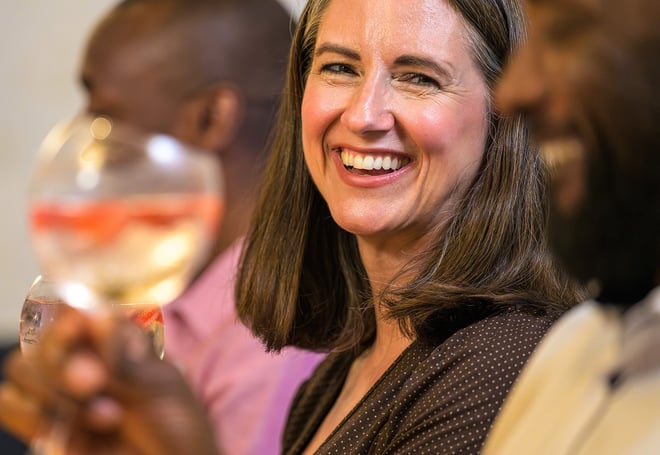 Guests at a Warner Hotel enjoying drinks at the bar