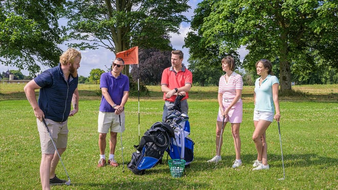 Group of guests learning gold position techniques